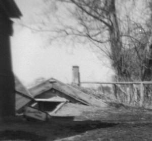 Root Cellar - notice the big heavy door covering the opening. 