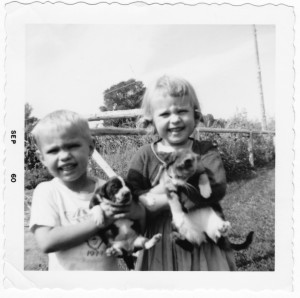 Peter holding Ringo; Debbie with a kitten.